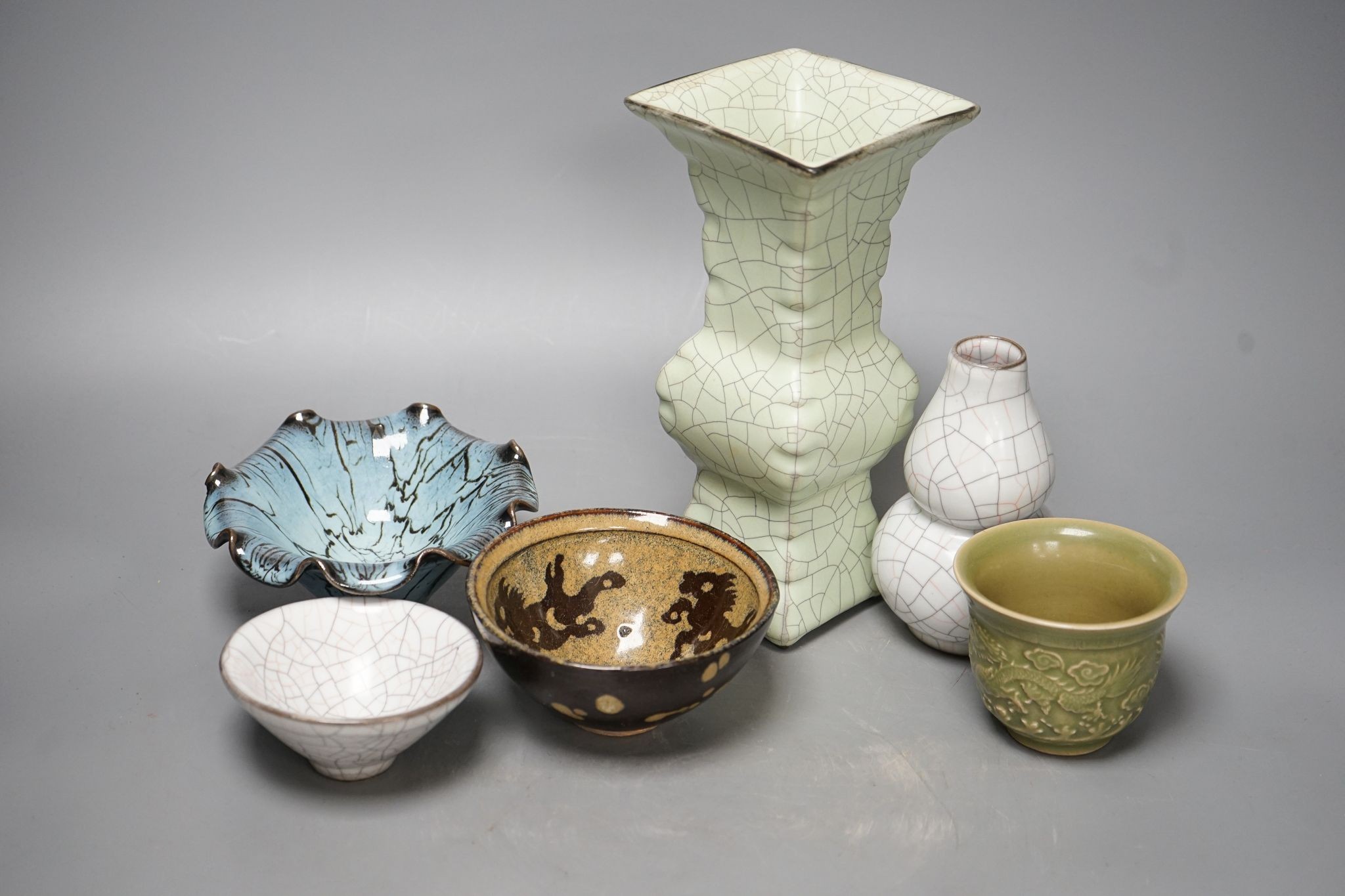 Chinese ceramics: three bowls, a cup and two vases, tallest vase 23cm